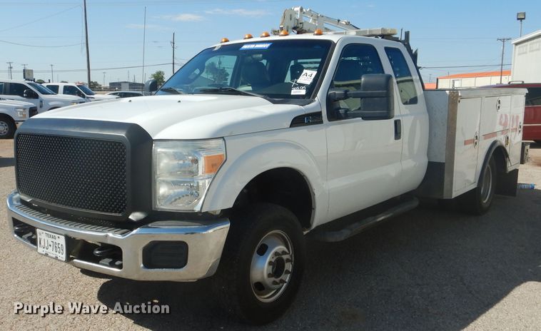 image for item HC9048 2012 Ford F350 Super Duty  utility bed pickup truck with crane