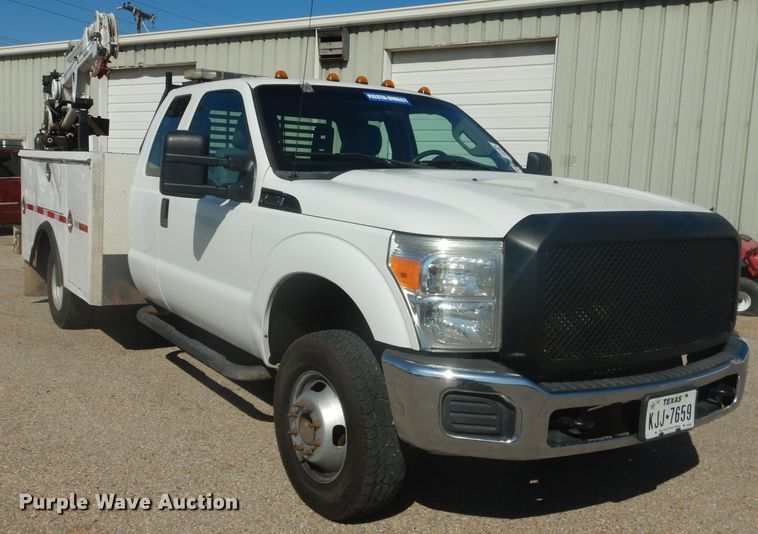 image for item HC9048 2012 Ford F350 Super Duty  utility bed pickup truck with crane