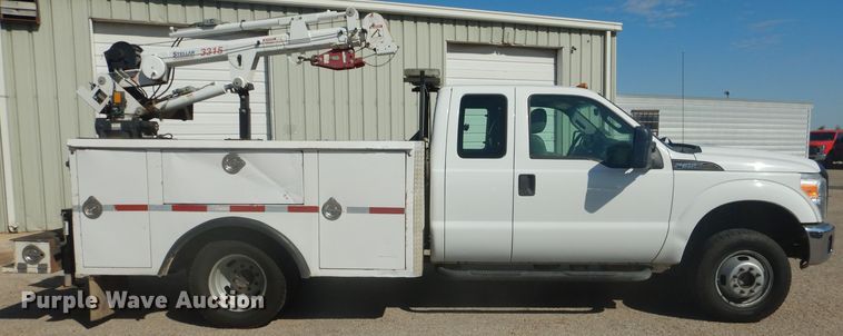 image for item HC9048 2012 Ford F350 Super Duty  utility bed pickup truck with crane