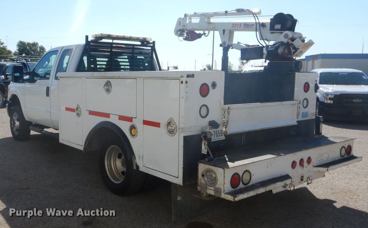 image for item HC9048 2012 Ford F350 Super Duty  utility bed pickup truck with crane