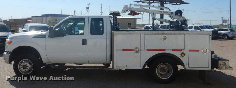 image for item HC9048 2012 Ford F350 Super Duty  utility bed pickup truck with crane