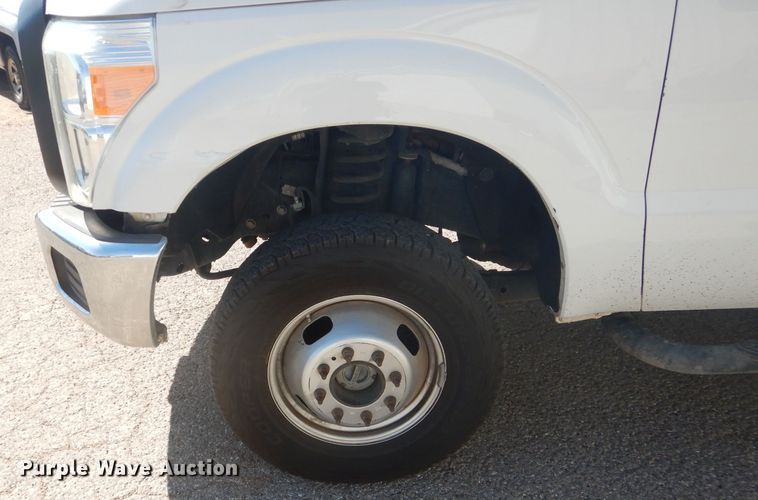 image for item HC9048 2012 Ford F350 Super Duty  utility bed pickup truck with crane