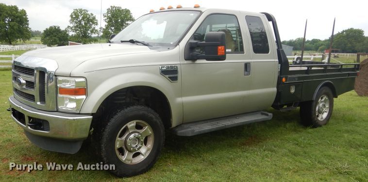 image for item HS9590 2010 Ford F350 Super Duty  SuperCrew bale bed pickup truck