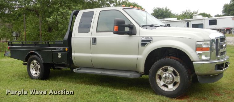 image for item HS9590 2010 Ford F350 Super Duty  SuperCrew bale bed pickup truck