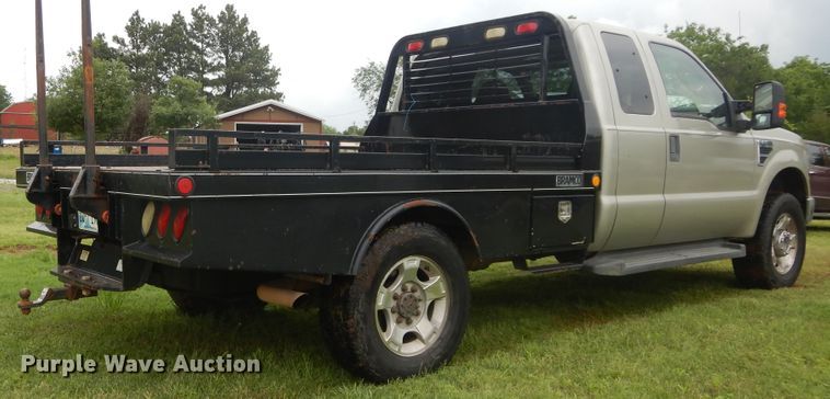 image for item HS9590 2010 Ford F350 Super Duty  SuperCrew bale bed pickup truck