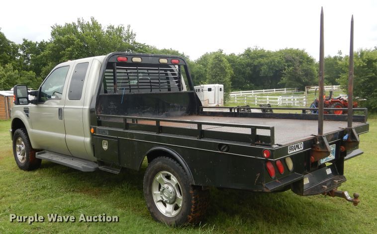 image for item HS9590 2010 Ford F350 Super Duty  SuperCrew bale bed pickup truck