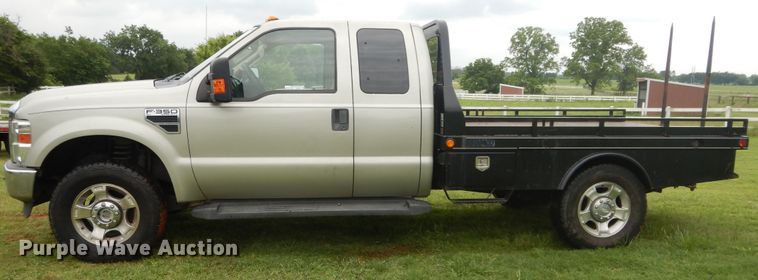image for item HS9590 2010 Ford F350 Super Duty  SuperCrew bale bed pickup truck