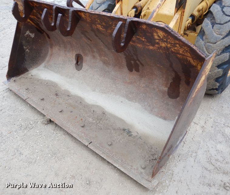 image for item DG6483 1977 Caterpillar 910  wheel loader