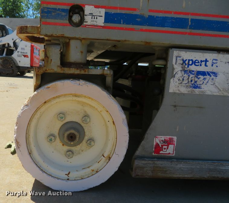 image for item DI2233 2012 Skyjack SJIII 3219  scissor lift