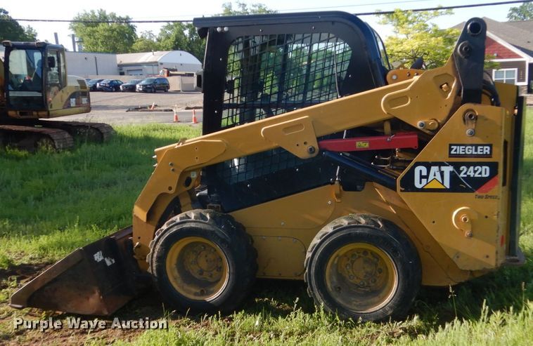 image for item GA9021 2015 Caterpillar 242D  skid steer loader