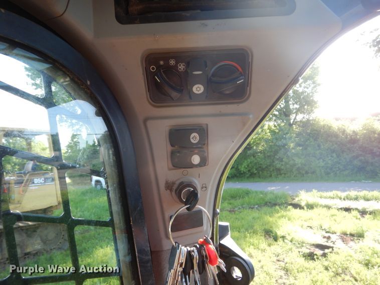 image for item GA9021 2015 Caterpillar 242D  skid steer loader