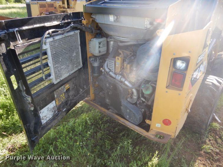image for item GA9021 2015 Caterpillar 242D  skid steer loader