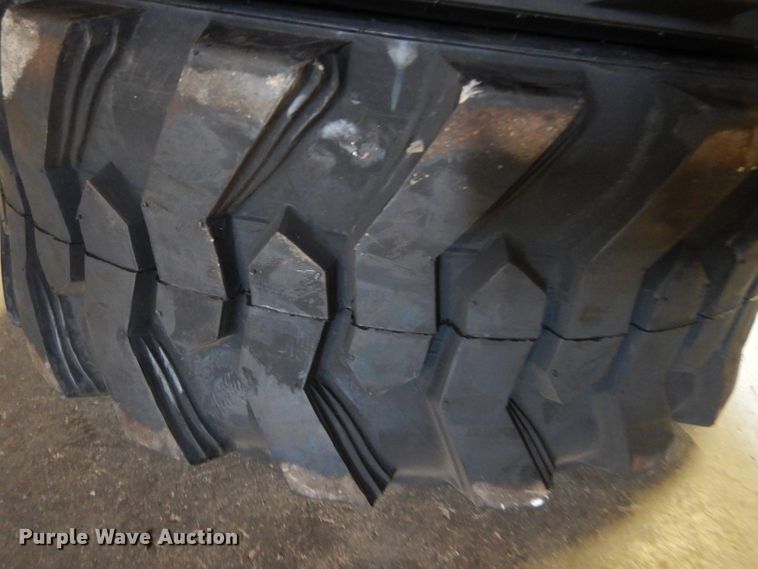 image for item GH9848 (4) Marcher 12-16.5 skid steer tires