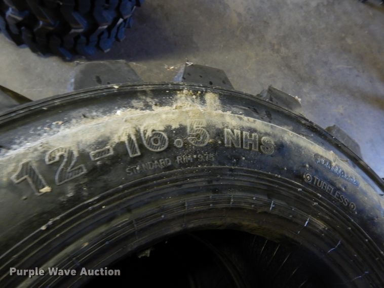 image for item GH9849 (4) Marcher 12-16.5 skid steer tires