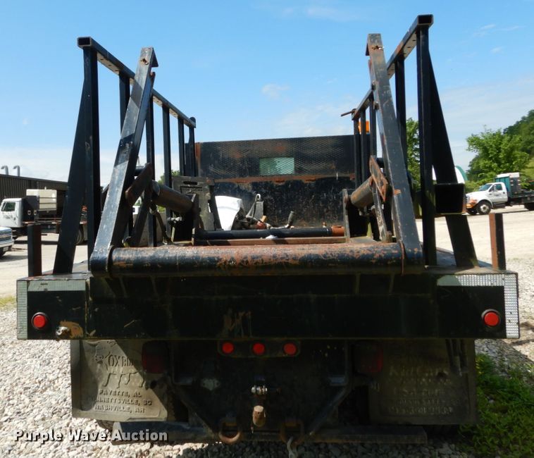 image for item GV9047 2004 Ford F750 Super Duty XL  flatbed truck