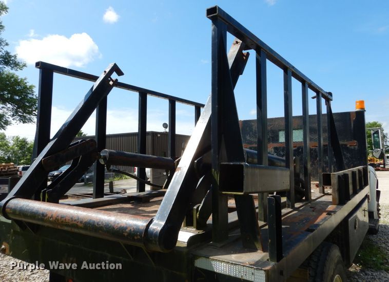 image for item GV9047 2004 Ford F750 Super Duty XL  flatbed truck