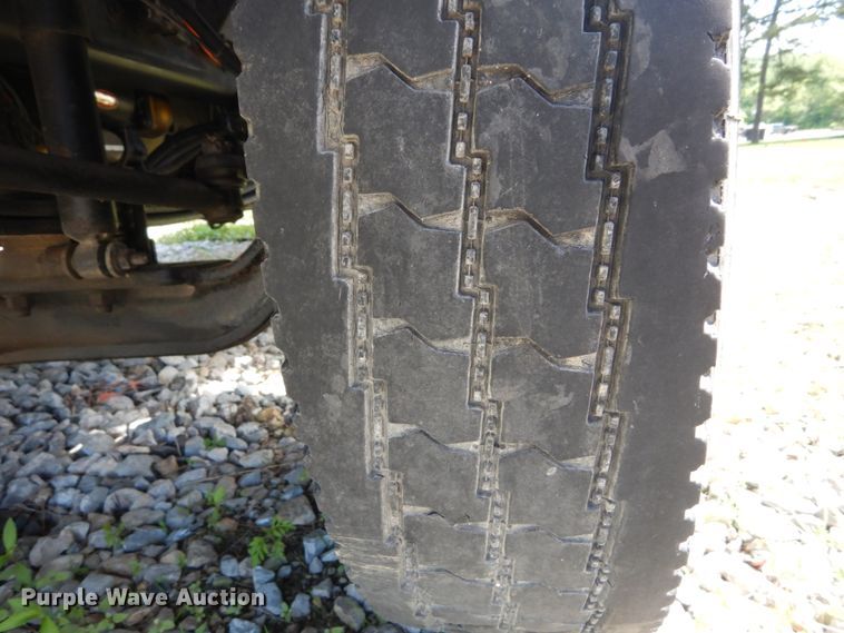 image for item GV9047 2004 Ford F750 Super Duty XL  flatbed truck