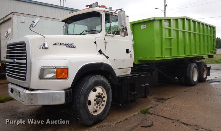 image for item GW9118 1995 Ford L9000  roll-off container truck
