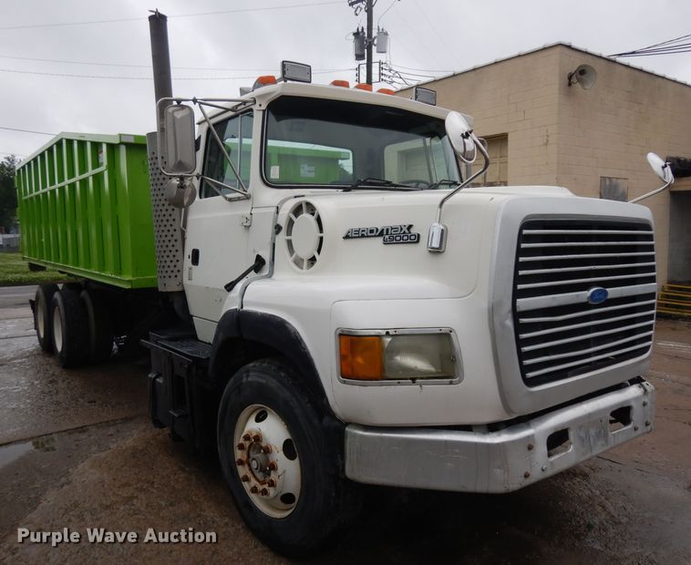 image for item GW9118 1995 Ford L9000  roll-off container truck