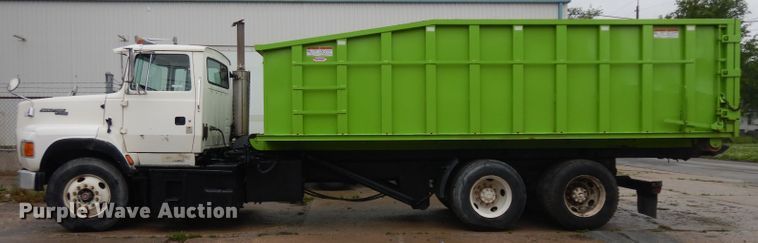 image for item GW9118 1995 Ford L9000  roll-off container truck