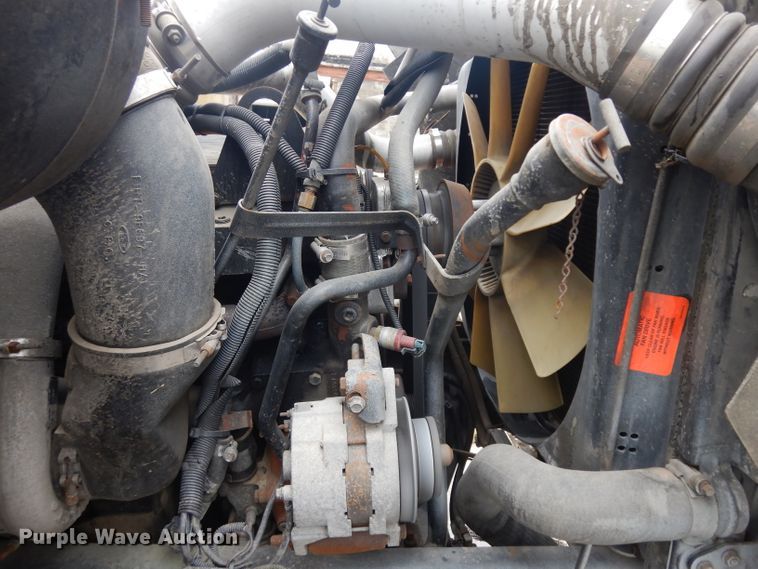 image for item GW9118 1995 Ford L9000  roll-off container truck