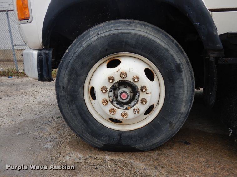 image for item GW9118 1995 Ford L9000  roll-off container truck