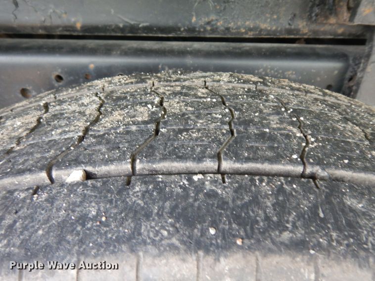 image for item GW9118 1995 Ford L9000  roll-off container truck