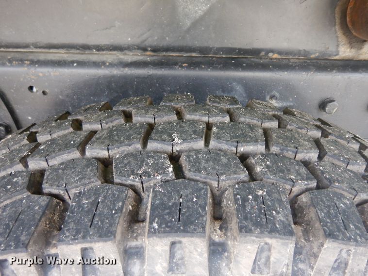 image for item GW9118 1995 Ford L9000  roll-off container truck