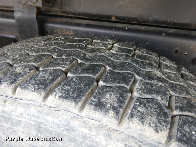 image for item GW9118 1995 Ford L9000  roll-off container truck