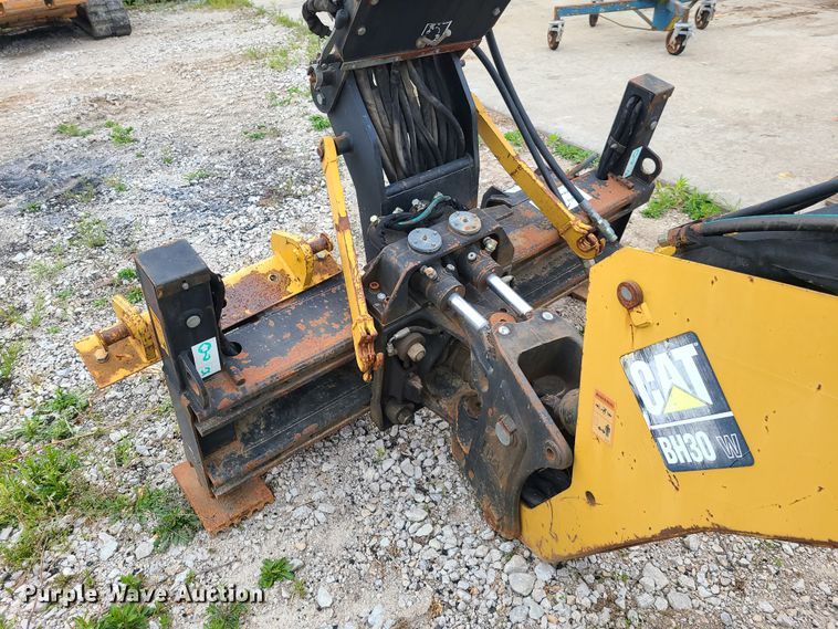 Caterpillar BH30 skid steer backhoe in Richmond, MO Item K5882 sold