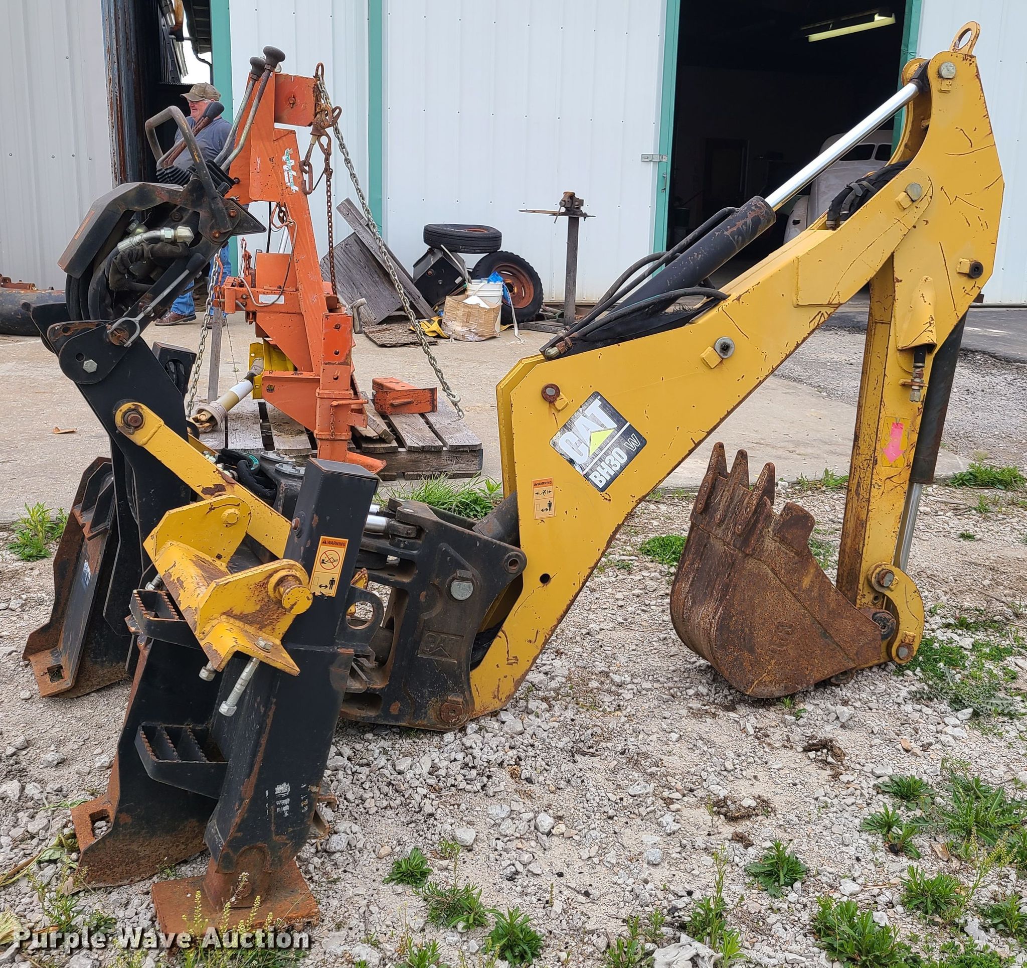 Caterpillar BH30 skid steer backhoe in Richmond, MO Item K5882 sold
