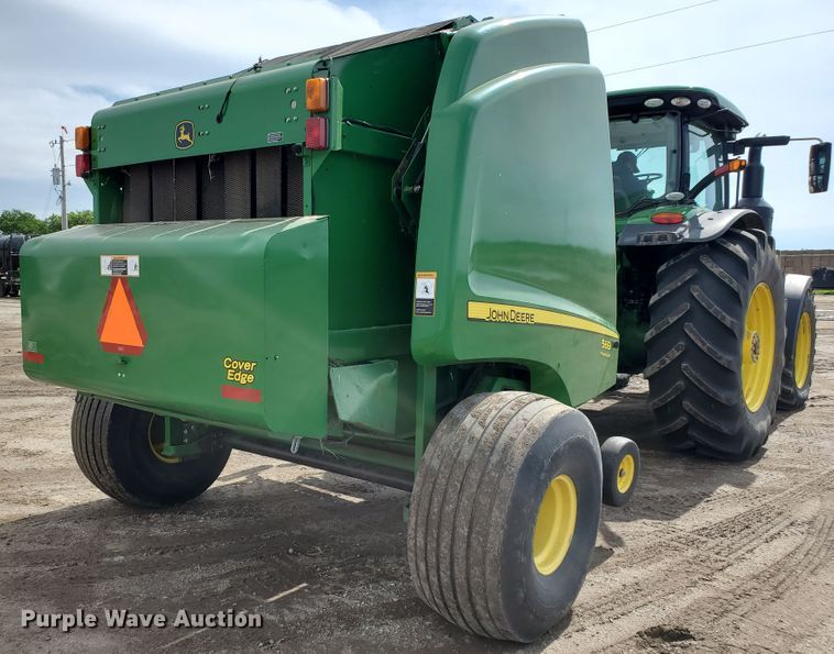 image for item GX9942 2014 John Deere 569 Premium round baler