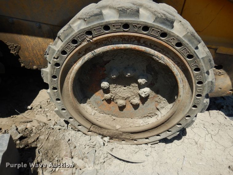 image for item DF4116 2006 John Deere 317  skid steer loader