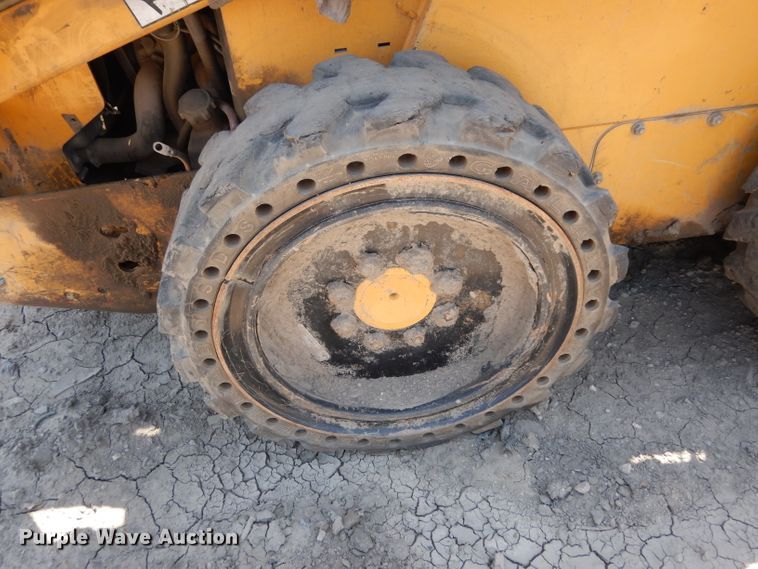 image for item DF4116 2006 John Deere 317  skid steer loader