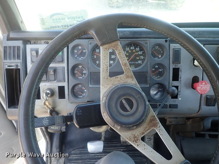 image for item DG2178 1999 Freightliner FL80  flatbed truck
