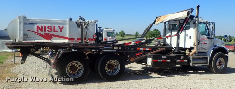 image for item DG2204 2009 Freightliner Business Class M2  roll-off container truck