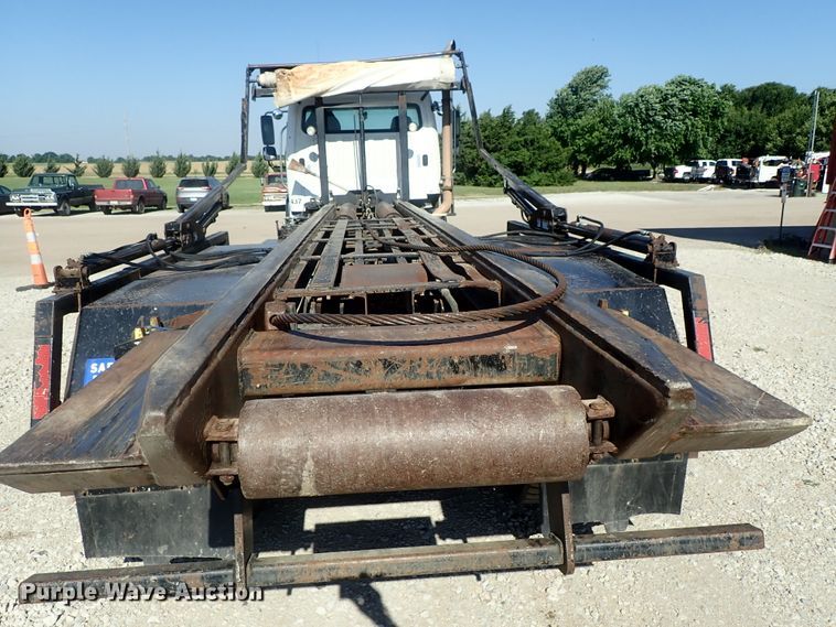 image for item DG2204 2009 Freightliner Business Class M2  roll-off container truck