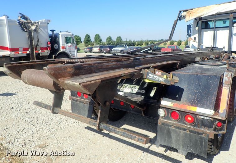 image for item DG2204 2009 Freightliner Business Class M2  roll-off container truck