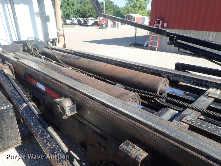 image for item DG2204 2009 Freightliner Business Class M2  roll-off container truck