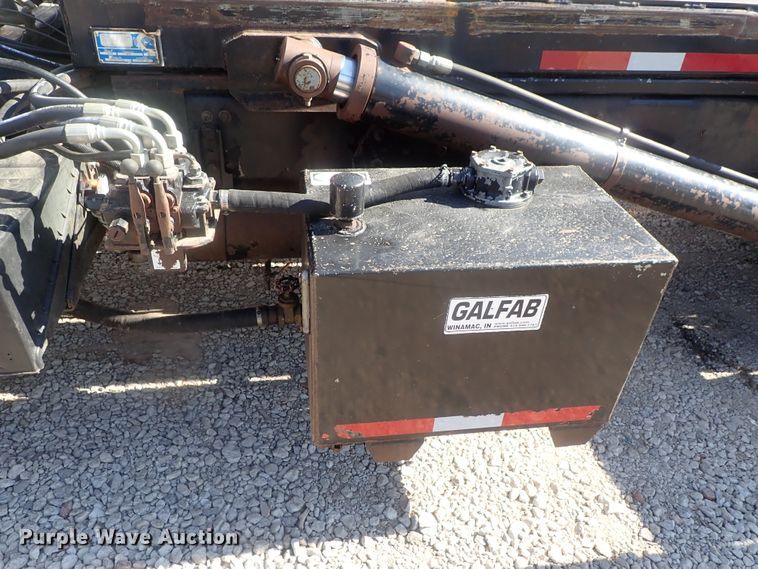 image for item DG2204 2009 Freightliner Business Class M2  roll-off container truck