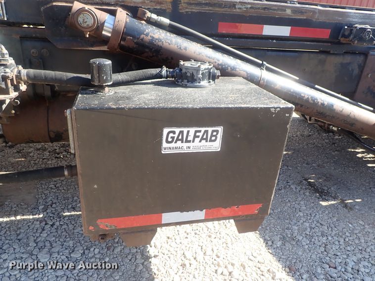 image for item DG2204 2009 Freightliner Business Class M2  roll-off container truck