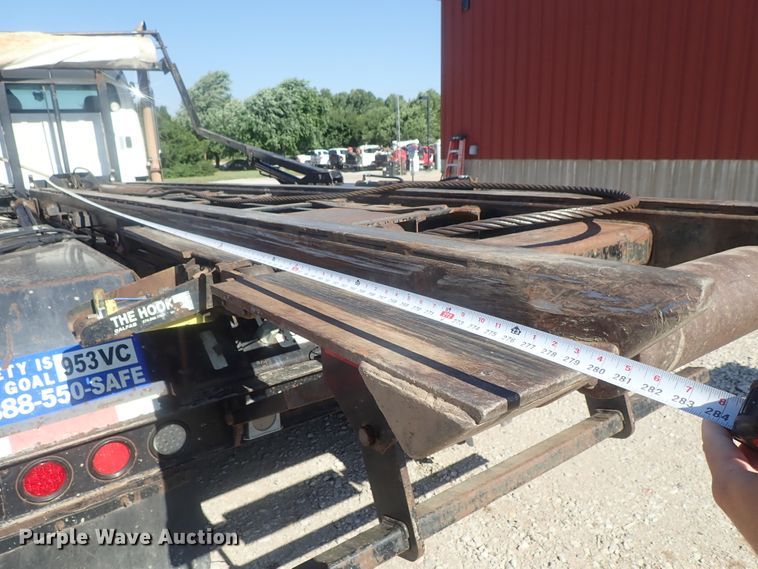 image for item DG2204 2009 Freightliner Business Class M2  roll-off container truck