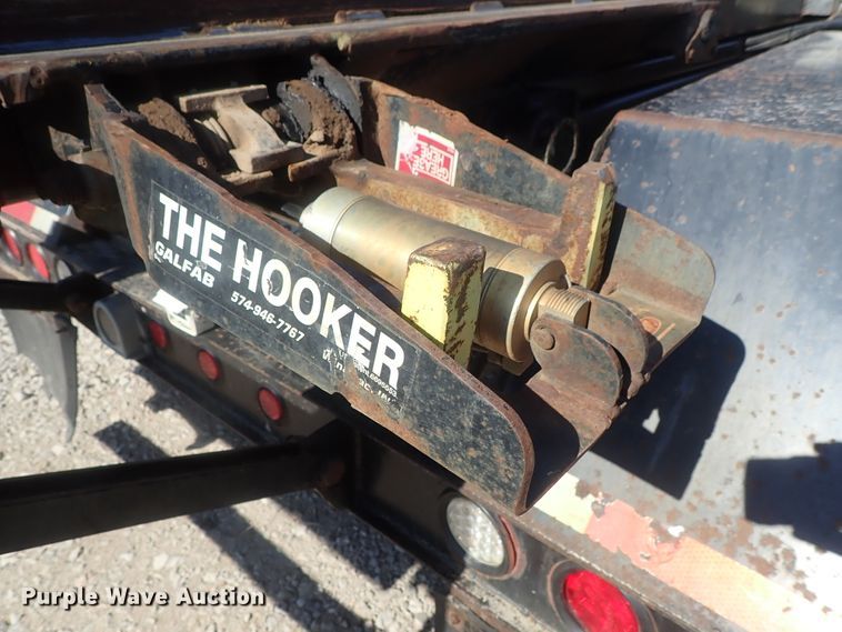 image for item DG2204 2009 Freightliner Business Class M2  roll-off container truck