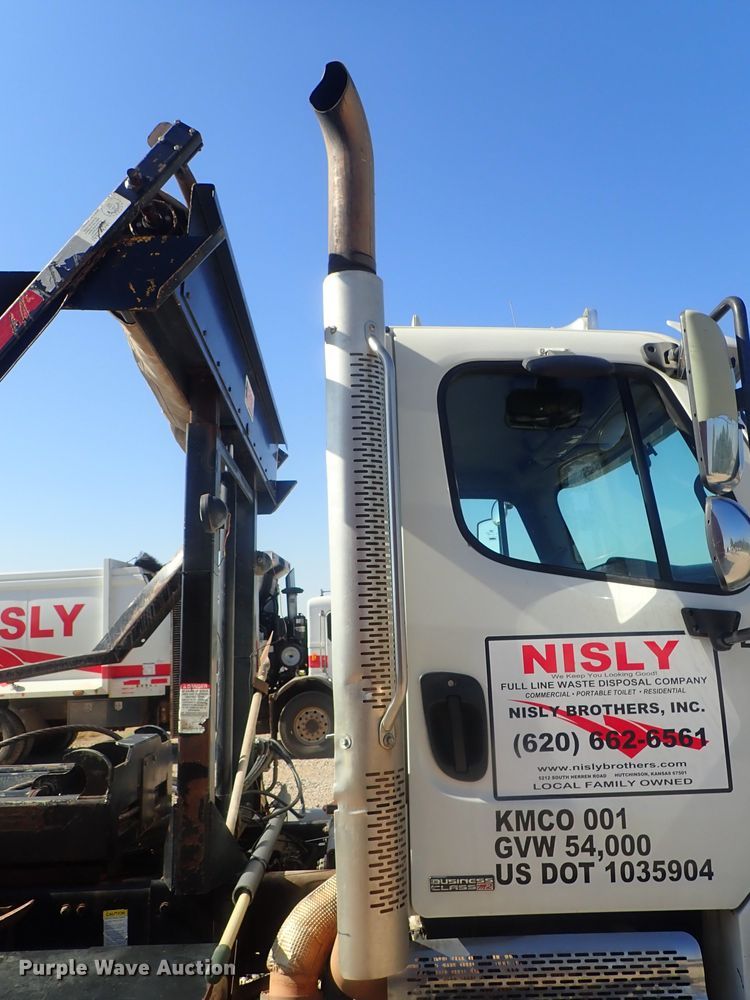 image for item DG2204 2009 Freightliner Business Class M2  roll-off container truck