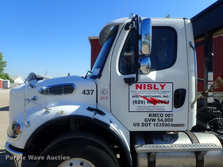 image for item DG2204 2009 Freightliner Business Class M2  roll-off container truck