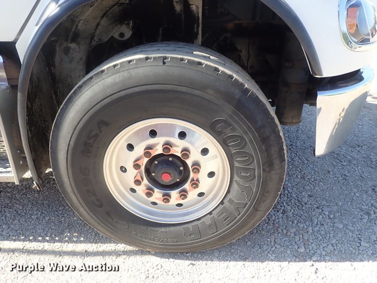 image for item DG2204 2009 Freightliner Business Class M2  roll-off container truck