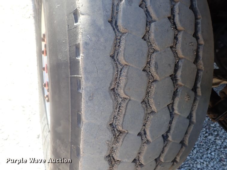 image for item DG2204 2009 Freightliner Business Class M2  roll-off container truck