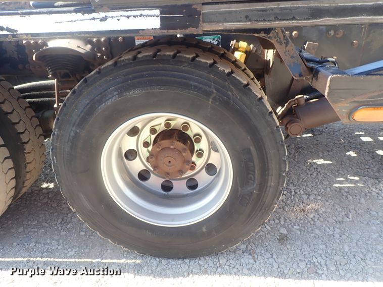 image for item DG2204 2009 Freightliner Business Class M2  roll-off container truck