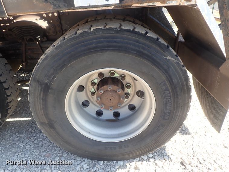 image for item DG2204 2009 Freightliner Business Class M2  roll-off container truck