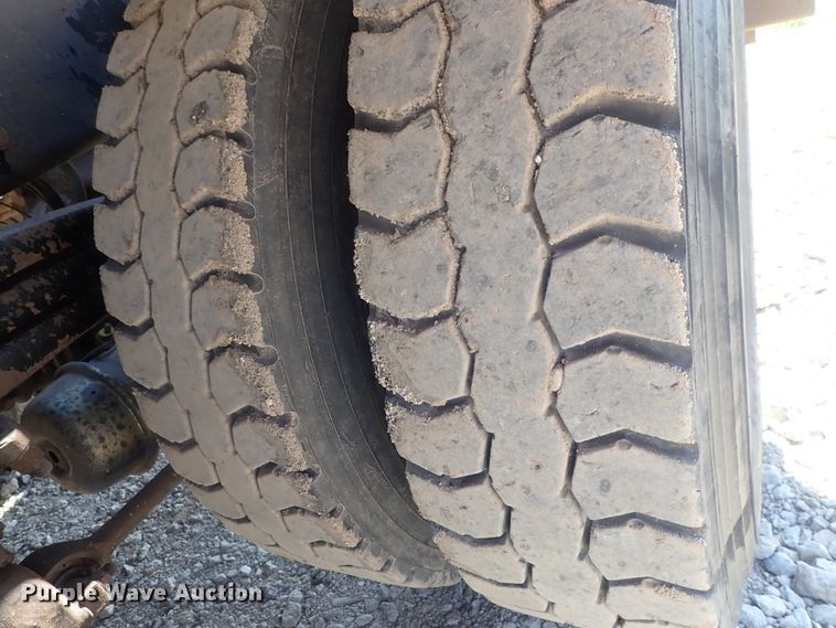 image for item DG2204 2009 Freightliner Business Class M2  roll-off container truck